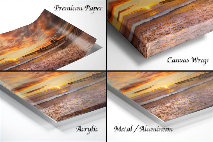 The image is a collage of four different views of a sunset over a beach, with each view represented by a different material: premium paper, canvas wrap, acrylic, and metal/aluminum.