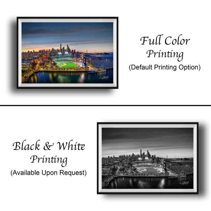 The image is a collage of two framed photographs. The top photograph is a full-color print of a city skyline at night, while the bottom photograph is a black and white print of the same city skyline. Both photographs are framed and available upon request.