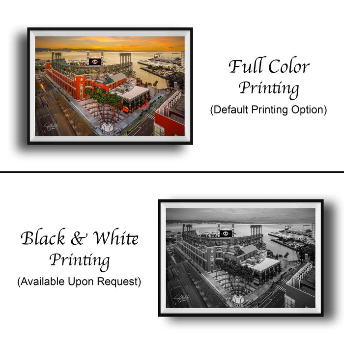 The image is a collage of two framed pictures. The left frame is a full-color print, while the right frame is a black and white print. Both frames depict a cityscape with buildings and a river. The left frame is labeled "Full Color Printing (Default Printing Option)" and the right frame is labeled "Black & White Printing (Available Upon Request)"