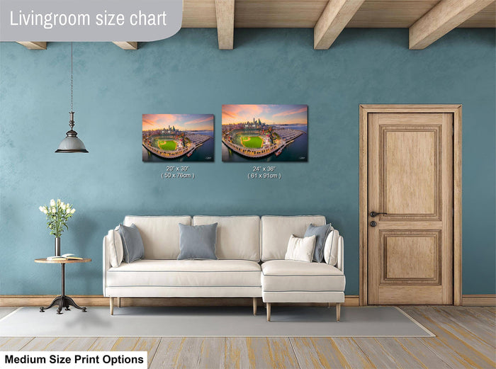 a living room with a white sofa, a wooden door, and a painting of a cityscape on the wall.