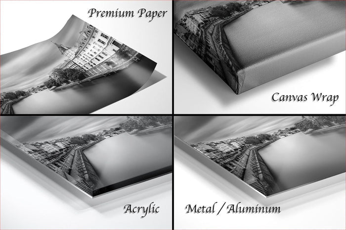 four different views of a black and white photograph of a cityscape, including a close-up of a bridge, a landscape view, and a close-up of a building. The text labels the different views as "Premium Paper", "Canvas Wrap", "Acrylic", and "Metal/Aluminum".