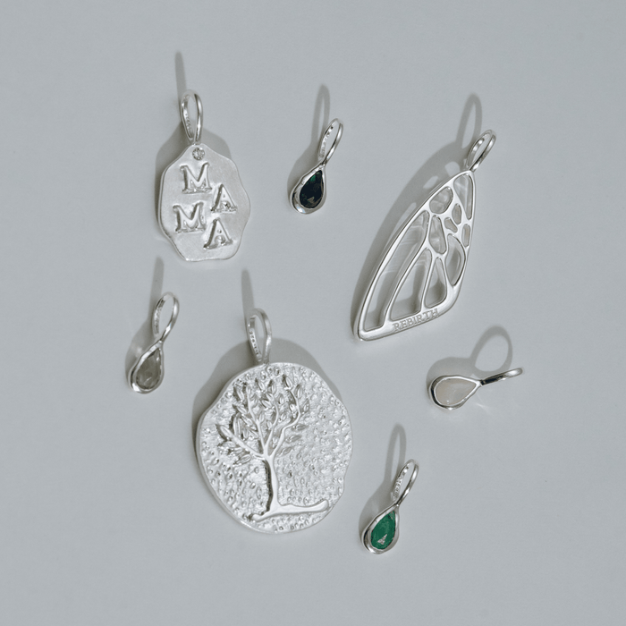 Silver necklace Charms part of a collection