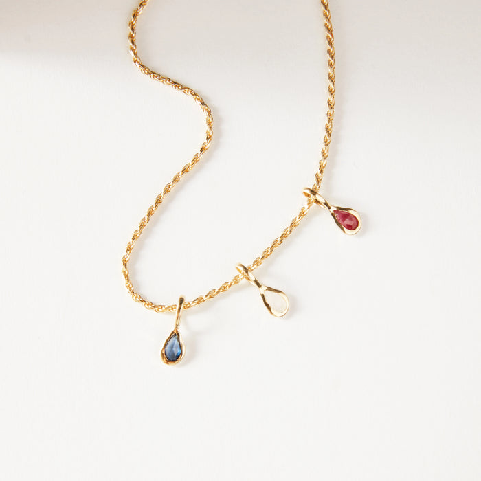 Pear Moonstone June Mood Birthstone Necklace Charm in 10k yellow gold with moonstone, studio detail view