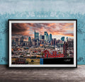 A framed photograph of the Philadelphia skyline at sunset, with the word "Phillies" prominently displayed in the foreground.