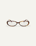 Face shot of Bonnie Clyde Pixie optical frames in tortoise with clear lenses.