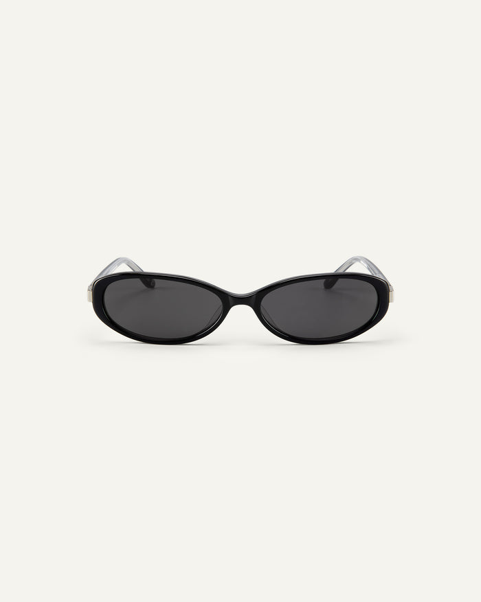 Face shot of Bonnie Clyde Pixie sunglasses in black with black lenses.