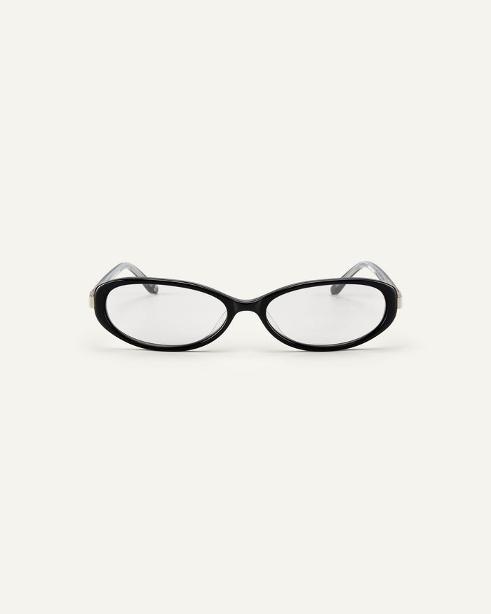 Face shot of Bonnie Clyde Pixie optical frames in black with clear lenses.