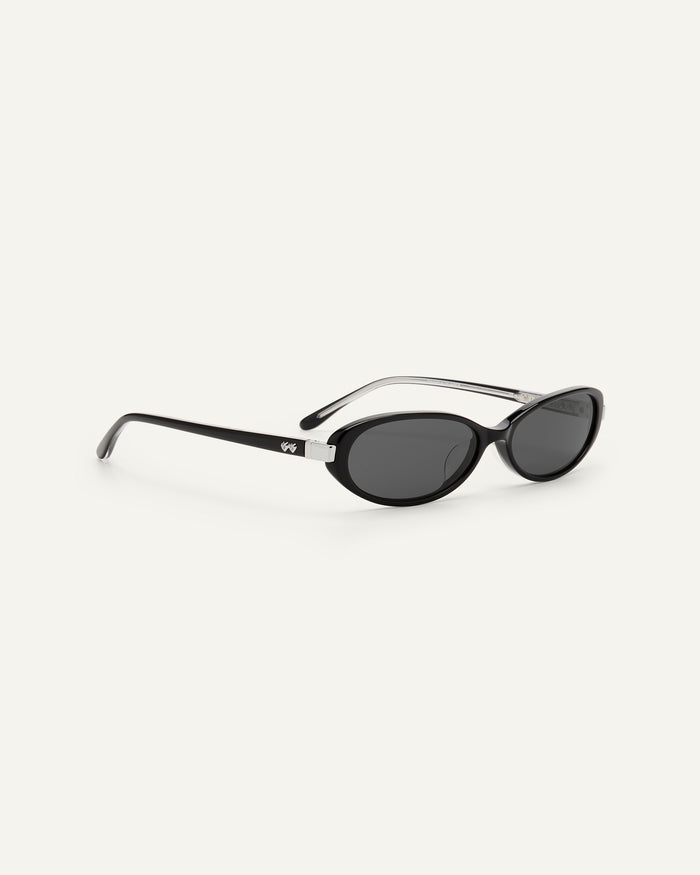 Side shot of Bonnie Clyde Pixie sunglasses in black with black lenses.