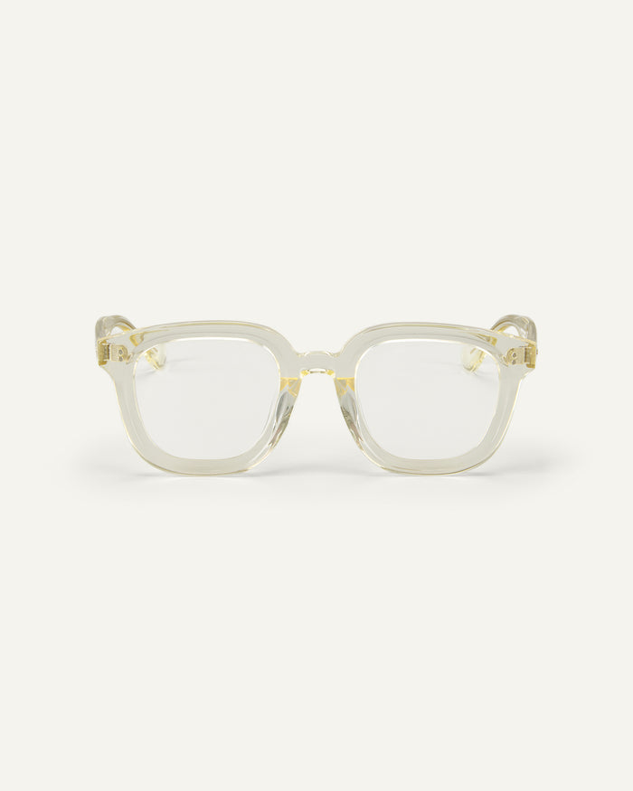 Face shot of Bonnie Clyde Playfight optical frames in transparent yellow with clear lenses.
