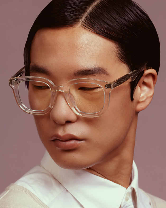Quarter shot of Bonnie Clyde Playfight optical frames in transparent yellow with clear lenses.