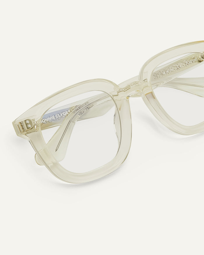 Close-up shot of Bonnie Clyde Playfight optical frames in transparent yellow with clear lenses.
