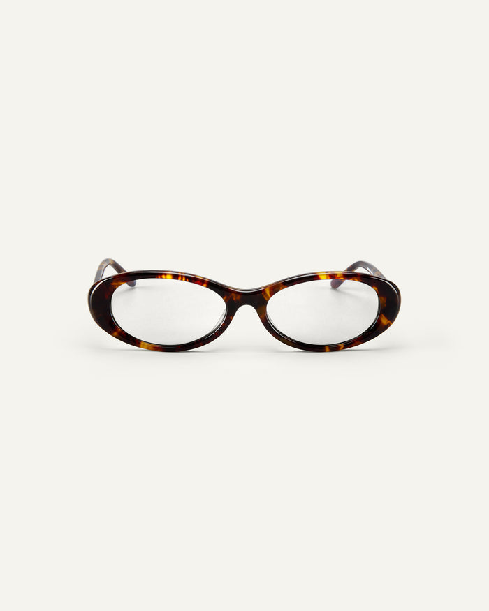 Face shot of Bonnie Clyde Pop Life sunglasses in tortoise with clear lenses.