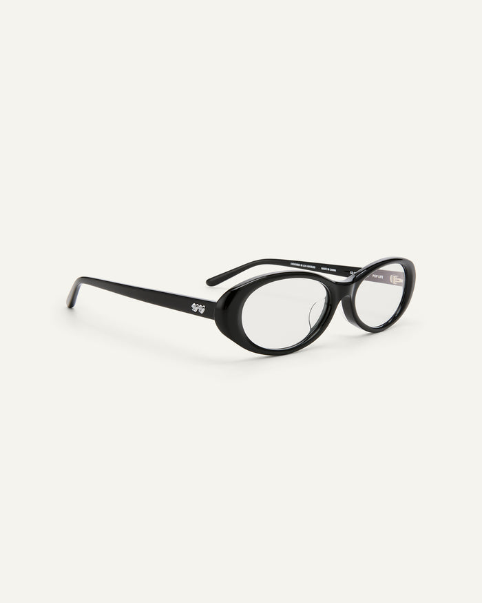 Quarter shot of Bonnie Clyde Pop Life sunglasses in black with clear lenses.
