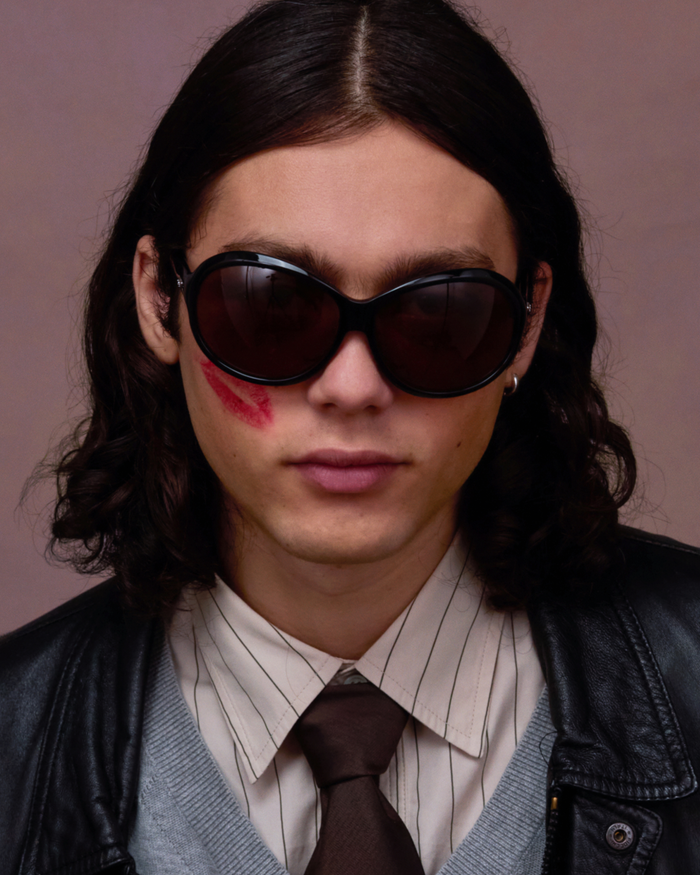 Quarter shot of Bonnie Clyde Princessa sunglasses in black with brown lenses.