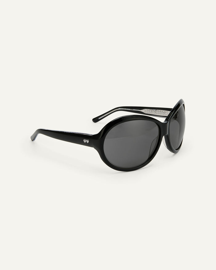 Close-up shot of Bonnie Clyde Princessa sunglasses in black with black lenses.