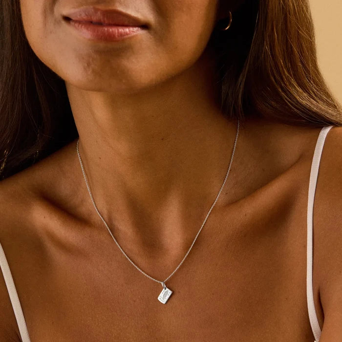 regina postcard charm - sterling silver