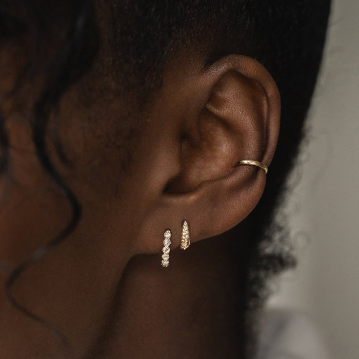 Restoration Mini Hoop in 14k yellow gold, alternate angle detail view