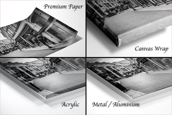 The image is a collage of four different views of a city street, each with a different material used to print the image: premium paper, canvas wrap, acrylic, and metal/aluminum.