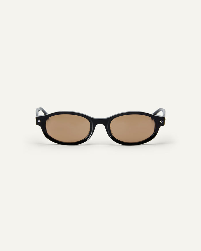 Face shot of Bonnie Clyde Roller Coaster sunglasses in black with brown lenses.