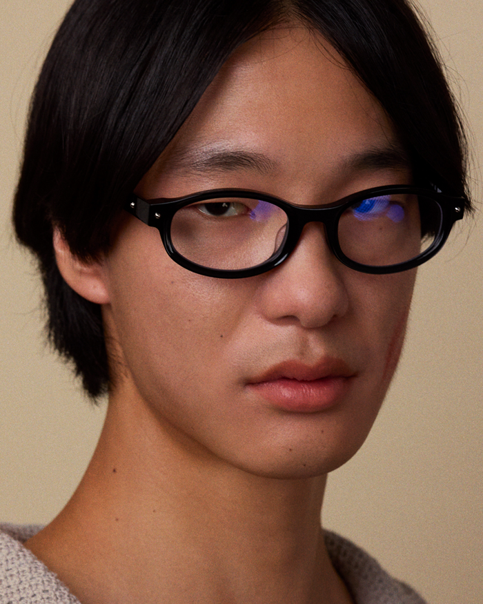 Quarter shot of Bonnie Clyde Roller Coaster optical frames in black with clear lenses.