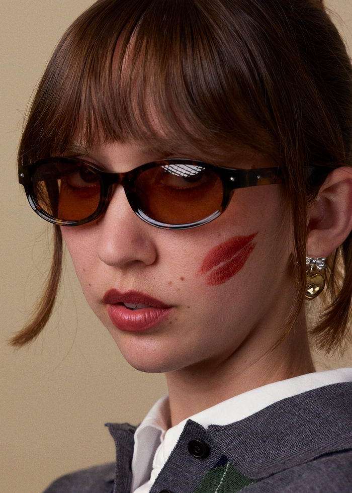Quarter shot of Bonnie Clyde Roller Coaster sunglasses in tortoise with brown lenses.