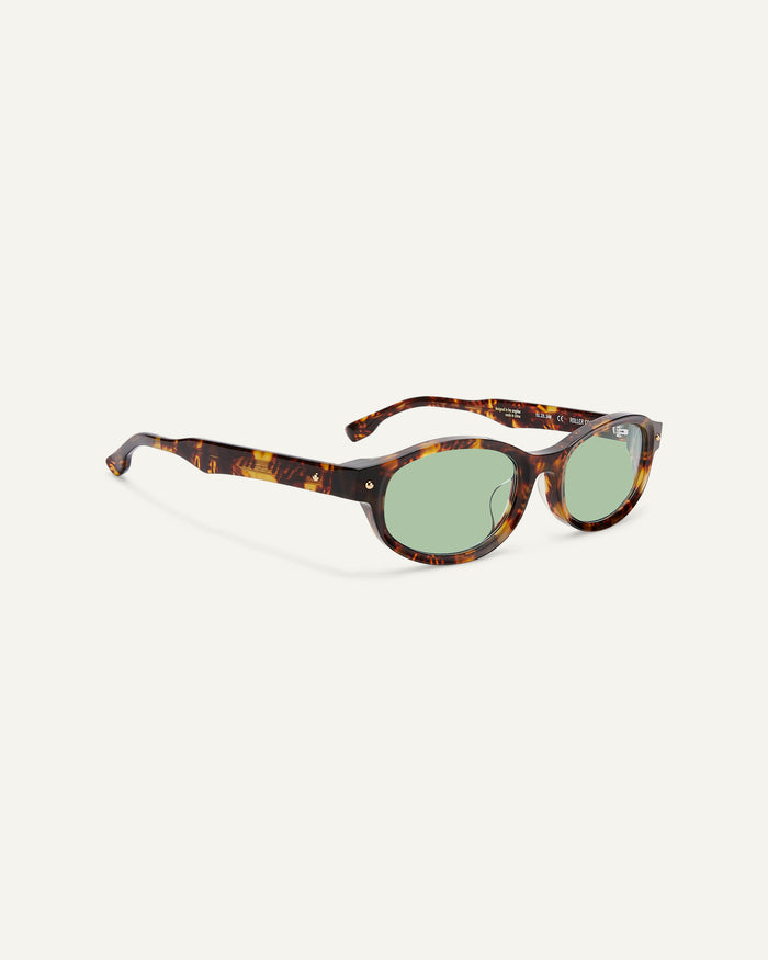 Side shot of Bonnie Clyde Roller Coaster sunglasses in tortoise with green lenses.