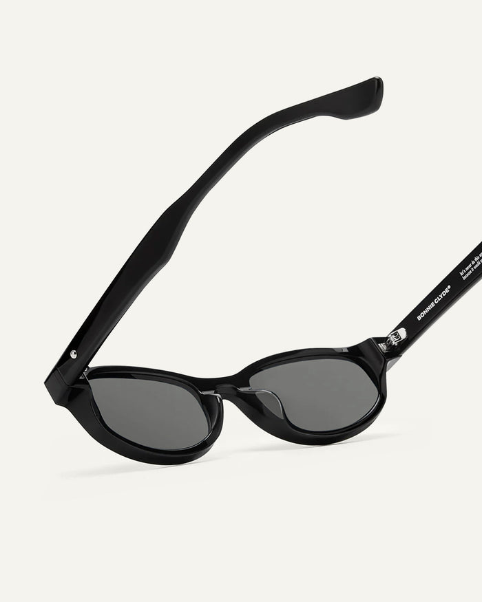 Side shot of Bonnie Clyde Roller Coaster sunglasses in black with black lenses.