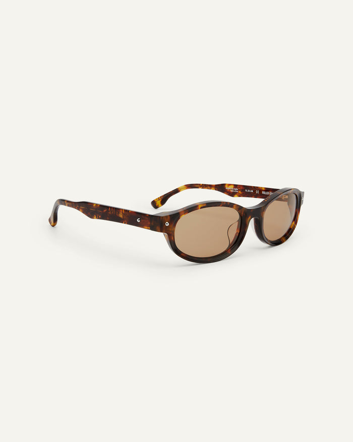 Side shot of Bonnie Clyde Roller Coaster sunglasses in tortoise with brown lenses.