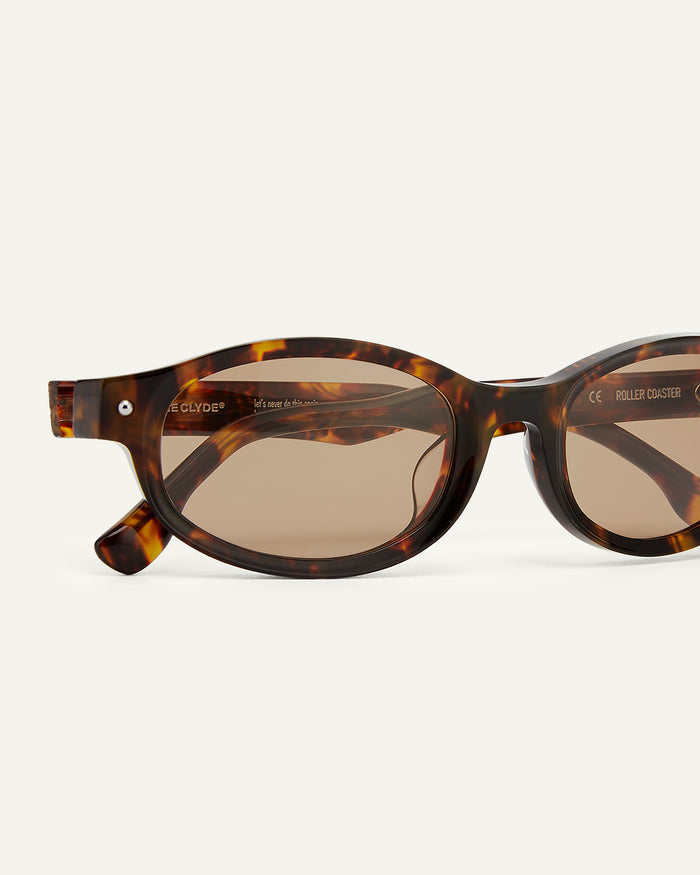 Close-up shot of Bonnie Clyde Roller Coaster sunglasses in tortoise with brown lenses.