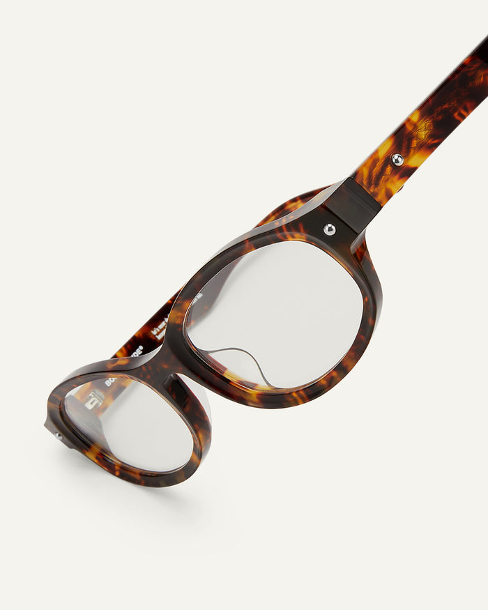 Close-up shot of Bonnie Clyde Roller Coaster optical frames in tortoise with clear lenses.