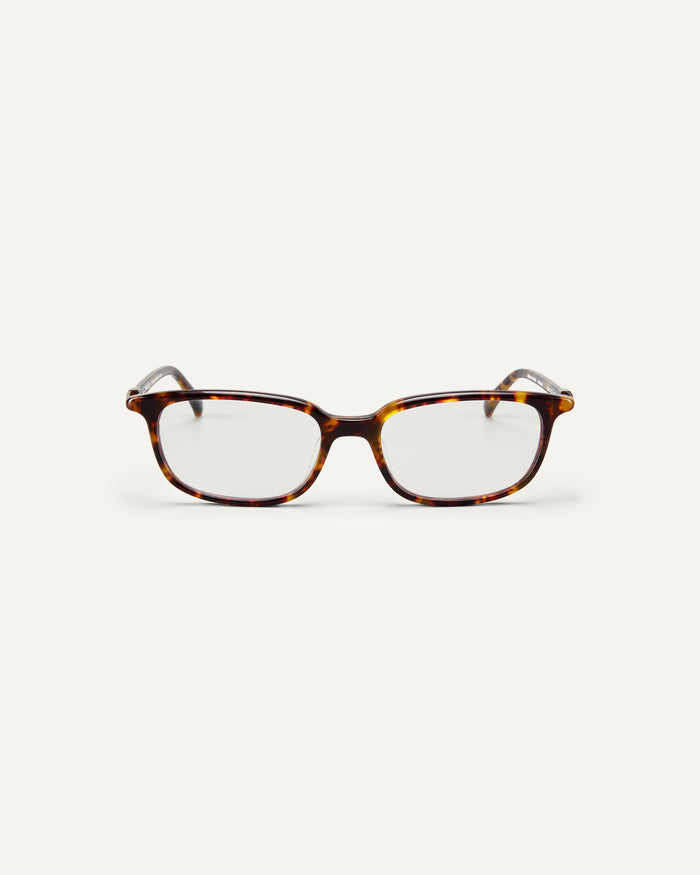 Face shot of Bonnie Clyde Rookie optical frames in tortoise with clear lenses.