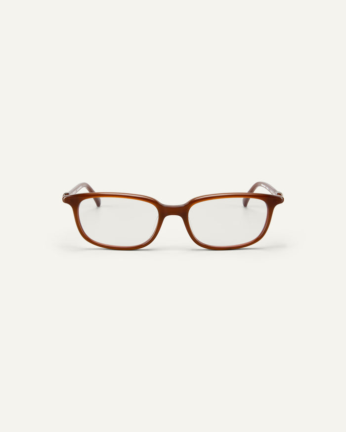 Face shot of Bonnie Clyde Rookie optical frames in brown with clear lenses.