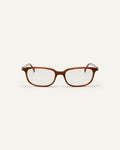 Face shot of Bonnie Clyde Rookie optical frames in brown with clear lenses.