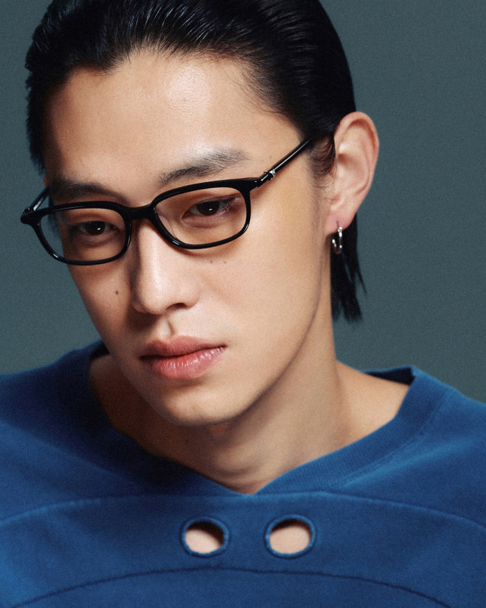 Side shot of Bonnie Clyde Rookie optical frames in black with clear lenses.