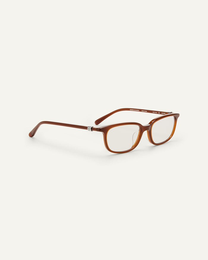 Close-up shot of Bonnie Clyde Rookie optical frames in brown with clear lenses.