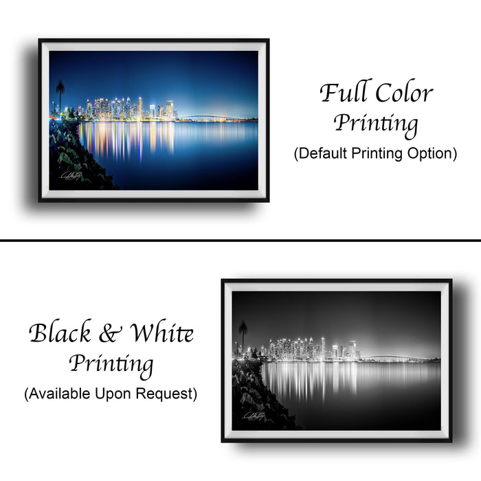 The image is a collage of two framed photographs. The top photograph depicts a city skyline at night, with the buildings illuminated and their reflections visible on the water. The bottom photograph is a black and white image of the same city skyline, with the buildings and their reflections visible on the water. Both photographs are framed and available upon request.