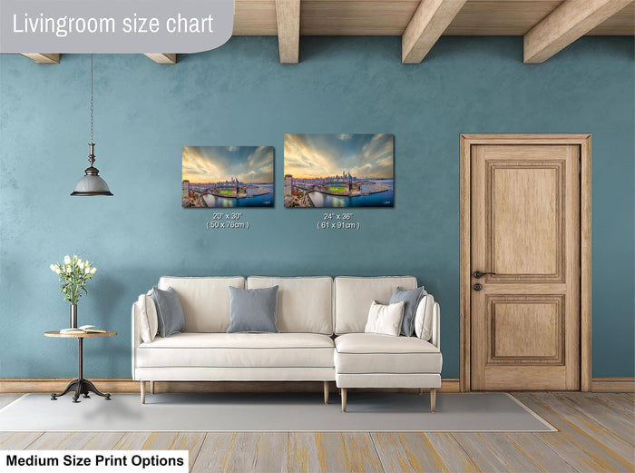 a living room with a white sofa, a wooden door, and a painting of a cityscape on the wall.
