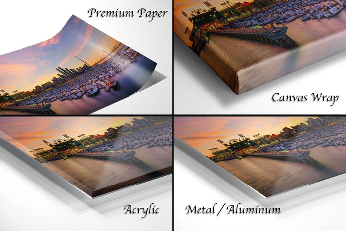 The image is a collage of four different views of a cityscape at sunset, with the city skyline and boats visible in each frame.
