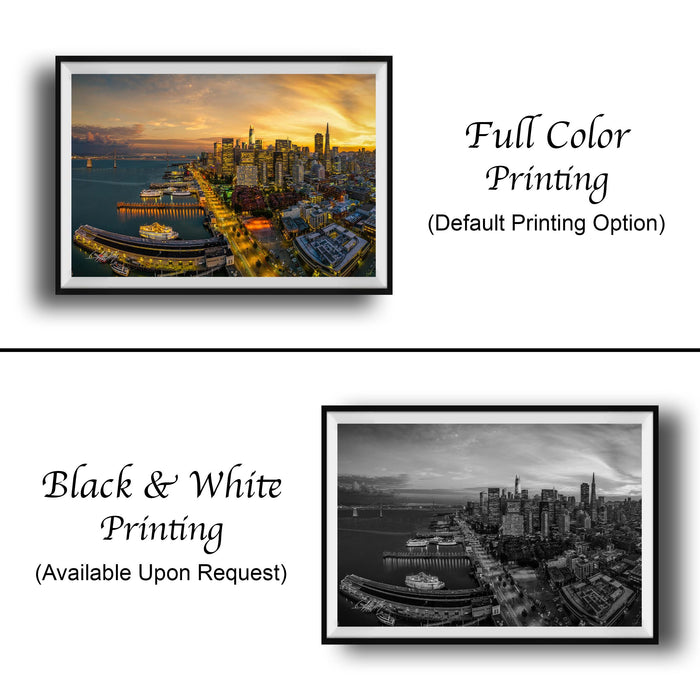 The image is a collage of two framed photographs. The top photograph is a full color print of a cityscape at sunset, while the bottom photograph is a black and white print of the same cityscape. Both photographs are framed and available upon request.