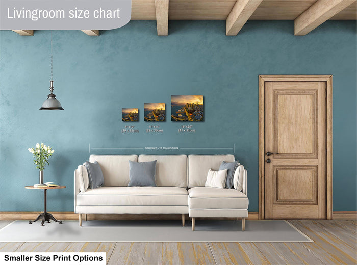 a living room with a white sofa, a wooden door, and a hanging light fixture. There are three framed artworks displayed on the wall, each with a different size and resolution. The living room appears to be designed for a smaller space, as indicated by the size chart provided.