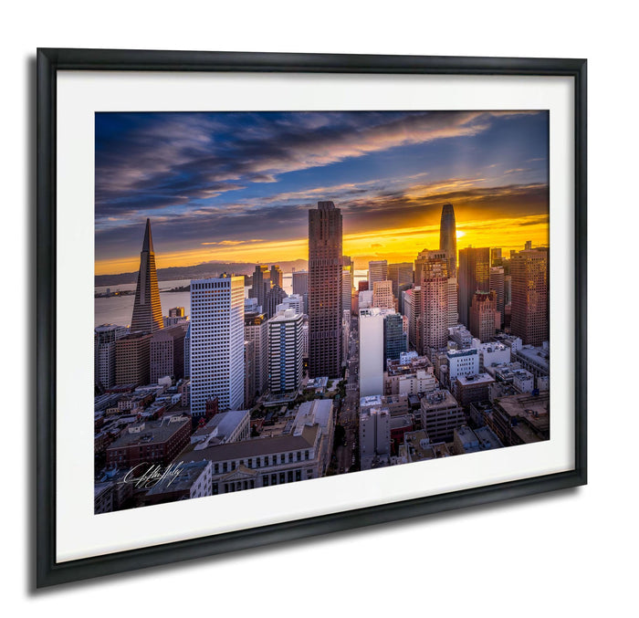 a cityscape with tall buildings and skyscrapers at sunset, creating a vibrant and colorful skyline.
