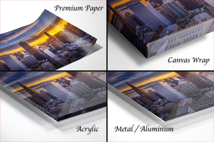 The image is a collage of four different views of a cityscape at sunset, with the city appearing in various materials such as acrylic, metal, and aluminum.