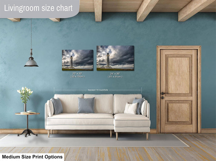 a living room with a white sofa, a wooden door, and a painting of a lighthouse on the wall. The living room appears to be designed for relaxation and comfort, with a cozy and inviting atmosphere.