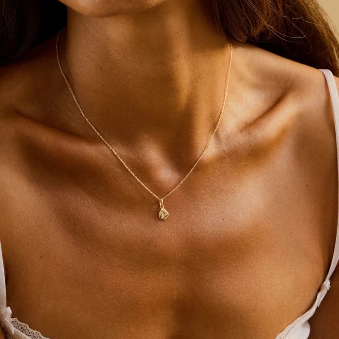 Shell Yah! Gold Necklace Charm in 10k yellow gold with diamonds, alternate angle detail view