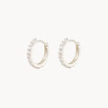 Shine On White Sapphire Huggie Hoops in sterling silver with white sapphires
