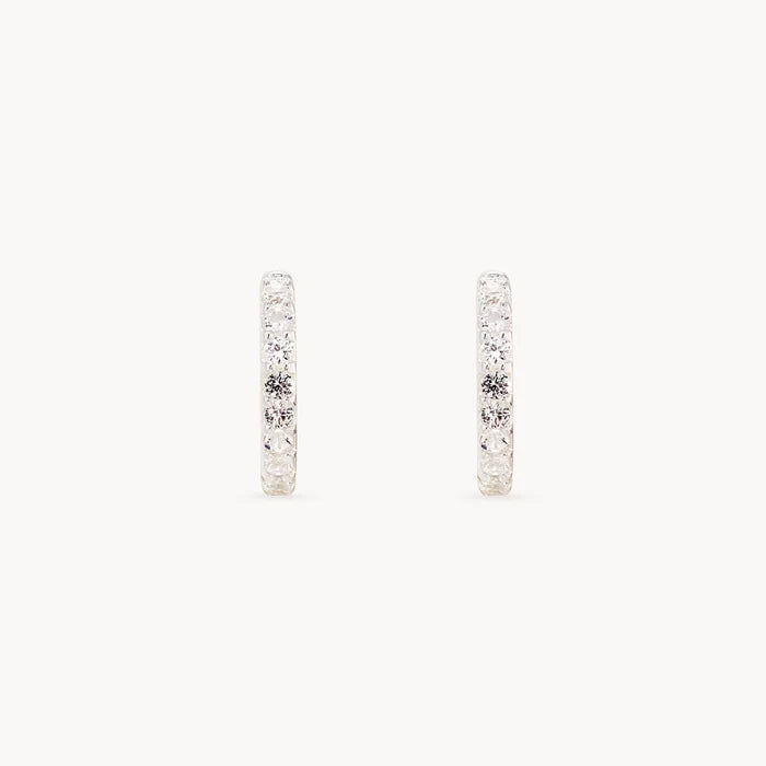 Shine On White Sapphire Huggie Hoops in sterling silver with white sapphires, alternate angle detail view