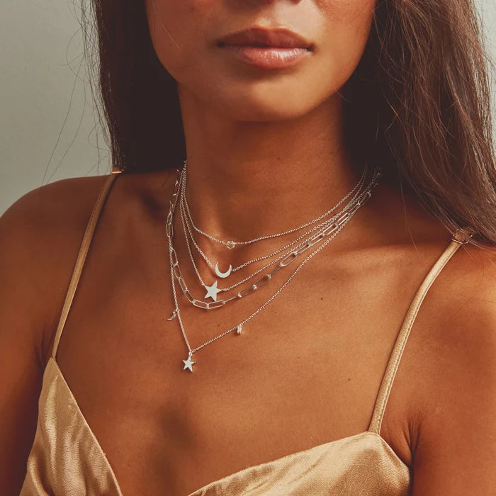 Silver Boldly Necklace in sterling silver, shown worn on hand