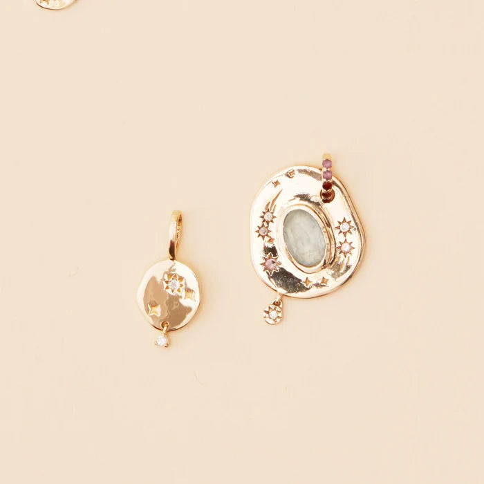 Small Air Element Charm in 10k yellow gold, studio detail view