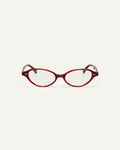 Face shot of Bonnie Clyde Small Talk optical frames in red tortoise with clear lenses.