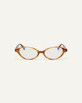Face shot of Bonnie Clyde Small Talk optical frames in yellow tortoise with clear lenses.